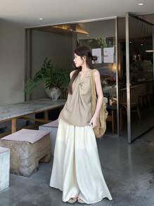 DAZY Bộ 2 món áo không tay xoắn phía trước màu trơn và chân váy cho nữ, dáng rộng thoải mái mùa hè - Màu be - Xem 10