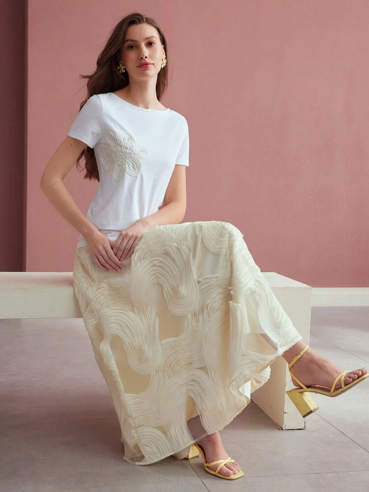 TEXTURED ELASTIC WAIST FLARED SKIRT