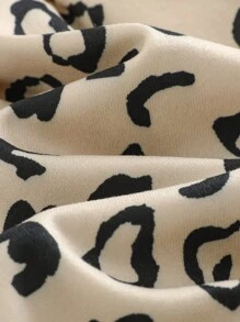 Cozy Pixies Conjunto de ropa de 2 piezas para niña bebé con top de manga acampanada con volantes y cuello de gran moño de color contrastante, y falda estilo evasé con estampado de leopardo - Negro - Ver 4