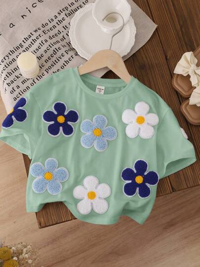 SHEIN LMoss Kids Young Girl Loose Fit Cute Floral Print Short Sleeve T-Shirt With Round Neckline And Drop Shoulders