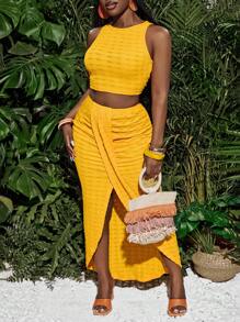 Slaydiva Nieuwe lente en zomer casual vakantie ronde hals mouwloos cropped vest + midden voorkant overlappende geplooide hoge split tot dij boog zoom asymmetrische zoom rok gele textuur stof dames tweedelige set