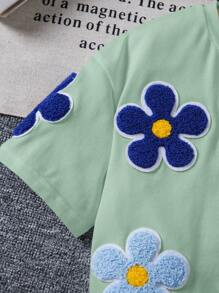 SHEIN LMoss Kids Young Girl Loose Fit Cute Floral Print Short Sleeve T-Shirt With Round Neckline And Drop Shoulders