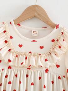 Cozy Pixies Young Girl Ditsy Floral Bow Decor Round Neck Ruffle Hem Waist Fitted Long Sleeve Dress