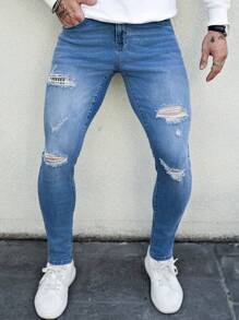 Manfinity LEGND Jeans de calle ajustados y entallados de color azul claro para hombres