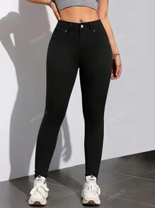 Jeans skinny casual femme de couleur unie avec boutons et poches à l'avant