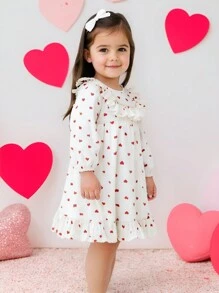 Cozy Pixies Young Girl Ditsy Floral Bow Decor Round Neck Ruffle Hem Waist Fitted Long Sleeve Dress