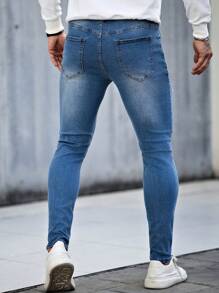 Manfinity LEGND Jeans de calle ajustados y entallados de color azul claro para hombres