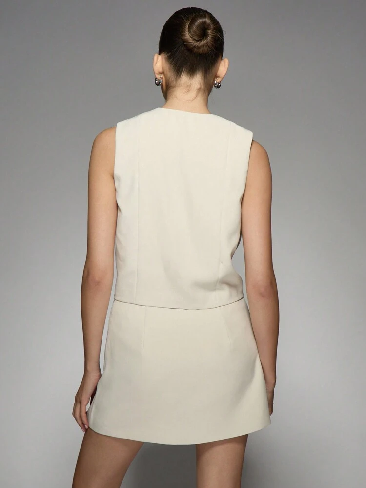 MISSGUIDED デザイナーのリボン付き2ピースセット ノースリーブ ベスト ミニスカート オケージョンパーティー 結婚式ゲスト フォーマル シック モダン