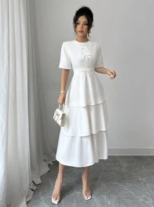Elenzga Minimalistische effenkleurige jurk met strikversiering en taartzoom voor dames