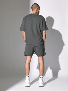 SUMWON Conjunto deportivo oversize de camiseta y pantalones cortos de entrepierna caída, conjunto de calle acanalado para descansar, informal, entrenamiento, gimnasio, estilo urbano casual, ajuste relajado para verano y primavera, set de dos piezas