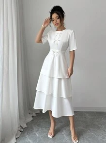Elenzga Minimalistische effenkleurige jurk met strikversiering en taartzoom voor dames