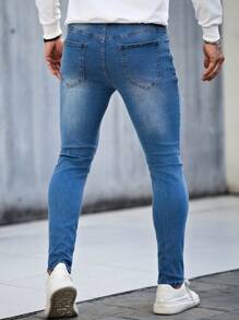 Manfinity LEGND Jeans de calle ajustados y entallados de color azul claro para hombres