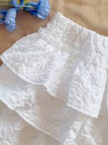 SHEIN Tween Girl Vacation White Woven Jacquard Textured A-Line Ruffle Hem Mini Skirt, Suitable For Party, Date, Valentine's Day, Holiday, Easter, Carnival, Beach Cruise, City Trip, Wedding Season, Afternoon Tea, Back To School/Graduation