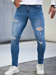 Manfinity LEGND Jeans de calle ajustados y entallados de color azul claro para hombres