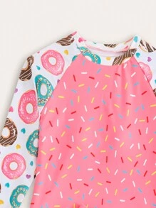 青少年女孩比基尼套装两件套女孩泳衣，带有明亮可爱的甜甜圈和糖印花；四面泳裤带有糖印花领带；长袖干爽，适合夏季海滩冲浪和海滩度假。