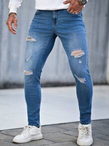 Manfinity LEGND Jeans de calle ajustados y entallados de color azul claro para hombres