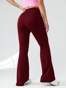 SHEIN EZwear Pantalones de pierna acampanada casuales de punto de color liso con bolsillos para mujer