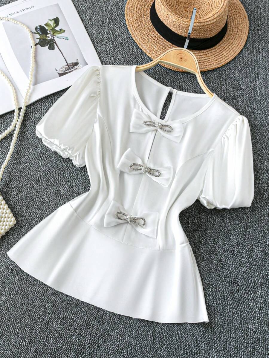 SHEIN Clasi Women's Elegant French Romantic Valentine's Day Solid Satin Rhinestone Bow Decor V-Neck Puff Sleeve Fitted Ruffle Hem Short Sleeve Blouse - White - View 1