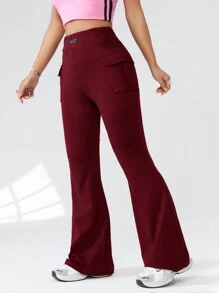 SHEIN EZwear Pantalones de pierna acampanada casuales de punto de color liso con bolsillos para mujer