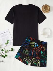 SHEIN 2 Piece Sets Snug Fit Night Wear Kids 2pcs Glow-In-The-Dark Video Game Print Men's Pajamas Set, Casual Comfortable Short Sleeve Shirt And Shorts, Sleepwear Sets (1 Set Is Sold Separately) .This Product Requires UV Light Exposure To Glow.