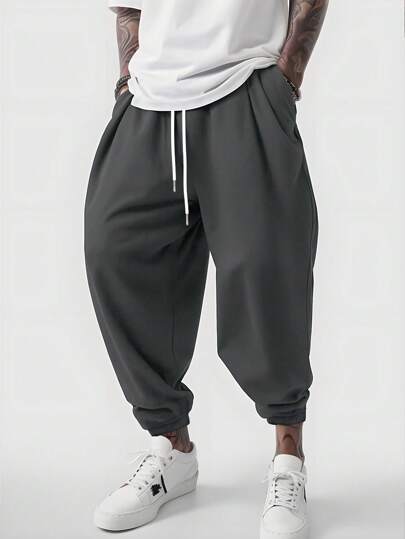 Manfinity Dauomo Pantalones casuales sueltos para hombre con cintura con cordón y dobladillo con banda, otoño