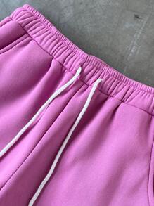 Manfinity EMRG Men's Street Fashion Casual Pants, Flared Bottom Graphic Print Sweatpants,Street Boys And  Fashionable Pair Of Elastic Tight-Waisted Mini Pants, Heart-Shaped Cartoon Pattern Print Design For Autumn And Winter Clothing,Perfect For Valentine's Day Couple Matching And Suitable For New Year Anniversaries.