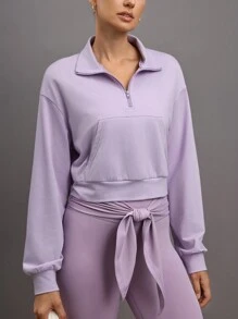 Activina Sudadera casual de deporte de manga larga con bolsillo y cremallera delantera de un solo color para mujer