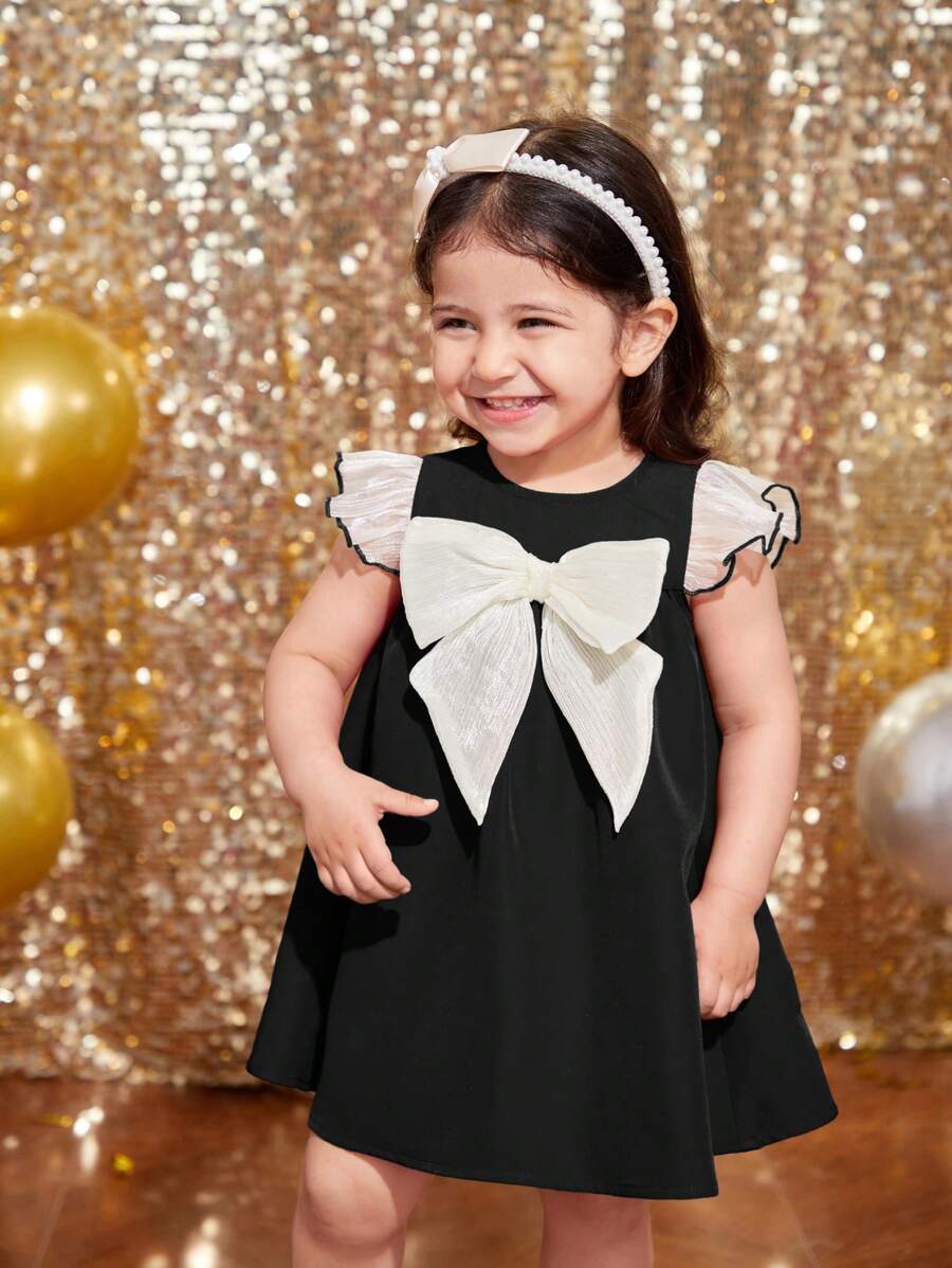 SHEIN Sukienka z kokardą dla dziewczynki, tkana, odpowiednia na świąteczne przyjęcie i spotkanie - Czarne - Zobacz 1
