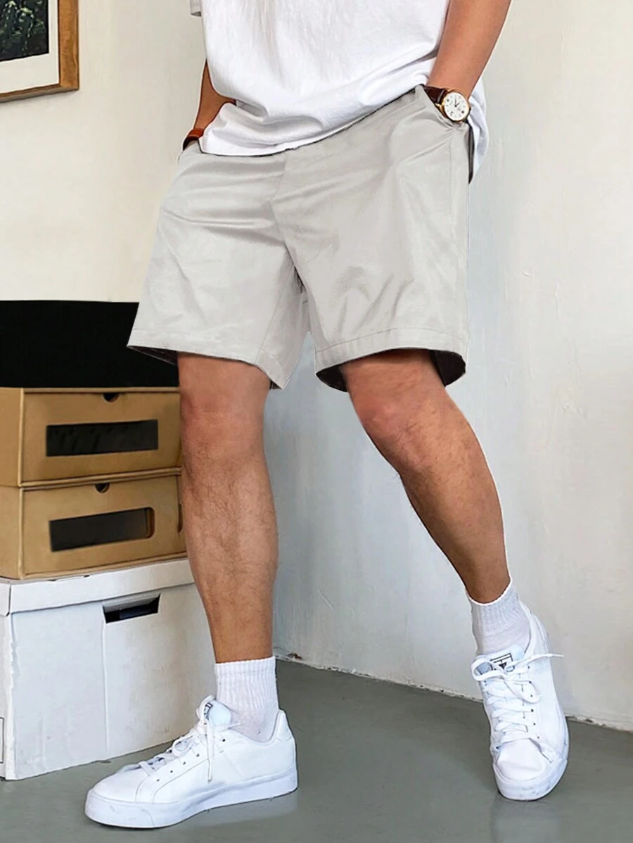 Manfinity Homme 宽松男士斜口袋抽绳腰短裤