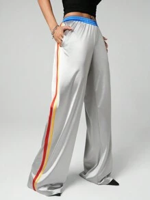 SHEIN ICON Pantalones deportivos sueltos con recorte de tela de color brillante plateado