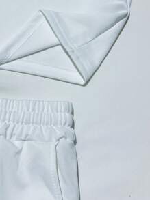 Manfinity EMRG Men's Casual Graphic Letter Print Short Sleeve T-Shirt And Shorts 2 Pieces Set