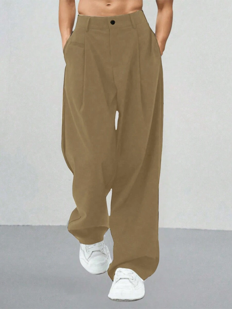 Manfinity Hypemode Pantalones casuales sueltos de hombre con bolsillo diagonal simple
