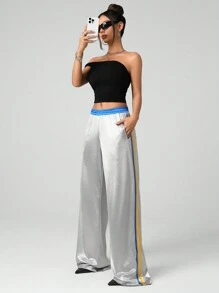 SHEIN ICON Pantalones deportivos sueltos con recorte de tela de color brillante plateado