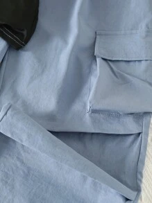 SHEIN مجموعة بنطلون قصير وتوب قصير مطبوع بالنجوم والحروف للفتيات والشباب، قطعتان ملائمة للصيف، بلون أحادي مع جيوب وخصر مطاطي - الأزرق - مشاهدة 7