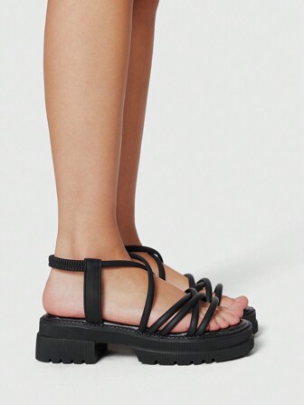 Goth Sandalias de playa romanas negras para mujer, zapatos de vacaciones de verano con plataforma y cuña, con abertura en los dedos y tiras cruzadas elásticas