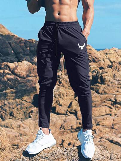 Manfinity Fitness Leggings de sport avec imprimé graphique et cordon de serrage pour hommes