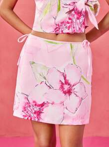 Becci 设计师粉色花卉印花高腰蝴蝶结 A 字迷你裙，适合春夏度假、海滩、节日、伊比沙岛