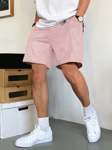 Manfinity Hypemode Pantalones cortos holgados para hombres con bolsillos en diagonal y cordón en la cintura