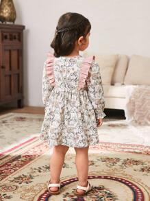 Cozy Pixies Babymeisjesjurk met ditsy bloemenpatchwork, geplooide kraag, lange mouwen en getailleerde taille