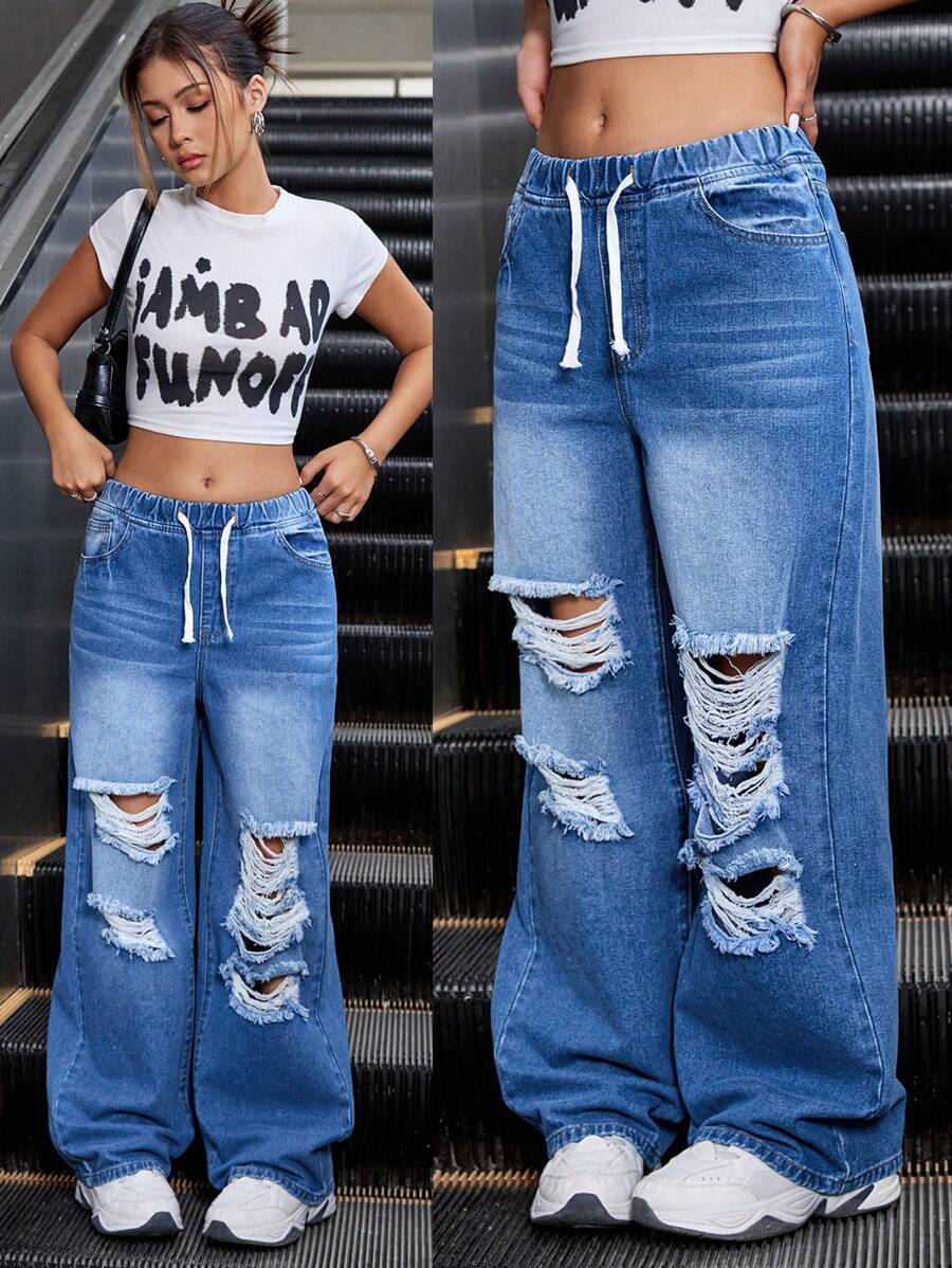 SHEIN 适合少女的时尚破洞阔腿休闲直筒牛仔裤，百搭 - 深色水洗藍 - 查看 1