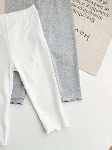 SHEIN 10 stuks/set babymeisje casual schattige veelzijdige effen kleur elastische taille gebreide leggings, multi-pack