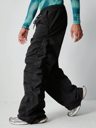 Street Life Pantalones largos sueltos de hombre con pliegues laterales y capas