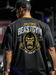 Manfinity Sport Corelite Camiseta deportiva de manga corta casual para hombre con estampado de letra de dibujo animado