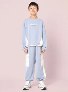 SUMWON Winterliches Outfit im Straßenmodestil NYC Kinder Set in Zwei Teilen, lässige Jogginganzug Freizeitkleidung, bequeme Jogginghose mit Kordel, legerer Trainingsanzug - Blau - Übersicht 1
