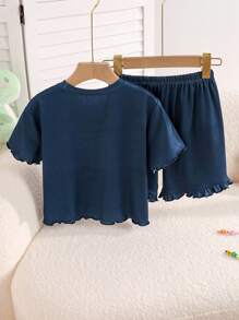 Conjunto de pijama de niña preadolescente con top de manga corta y short con estampado de unicornio