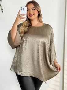 SHEIN CURVE+ Blusa elegante de mujer talla grande con cuello redondo, mangas 3/4, diseño suelto y bajo asimétrico en color metálico sólido, atuendos térmicos de invierno, ropa de mujer para Navidad, vestido de manga larga, vestido de mujer para Navidad, minifalda dorada, falda dorada, vestido de Acción de Gracias, vestido para Nochevieja, ropa de fiesta