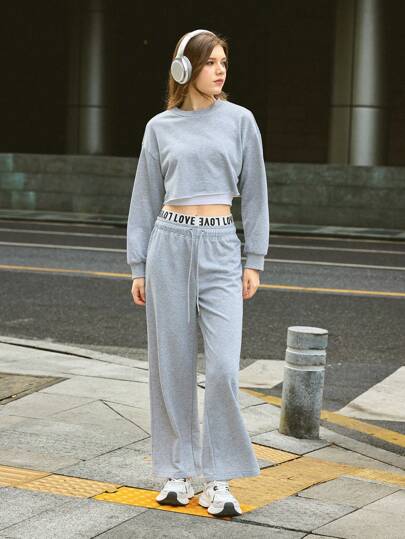 Jouncy Women's Solid Color Drop Shoulder Long Sleeve Sweatshirt And Drawstring Waist Pants Casual Suit