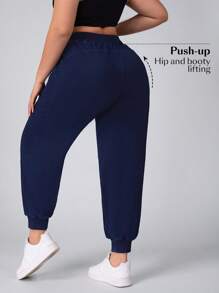 SHEIN Essnce Plus Size Solid Color Casual Denim Jeans, Minimalist Style For Everyday Wear Stretchy Knit Denim Apple Bottom Jeans - Blue - View 2