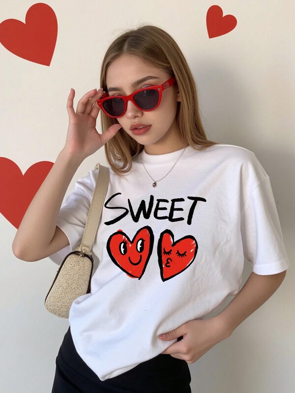 Camiseta de manga corta con estampado divertido de cara de fantasma, corazón y eslogan gráfico para adolescentes, de estilo casual y moderno