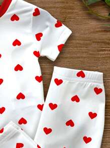 SHEIN Conjunto de 2 piezas de pijama informal para niña con estampado de lunares, corazones y diseños de dibujos animados, de manga corta, apropiado para primavera/verano